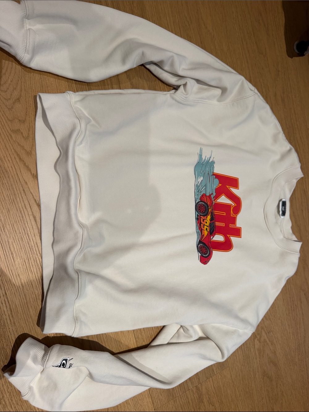 Kith Cream Sweatshirt with Red Racing Car Graphic